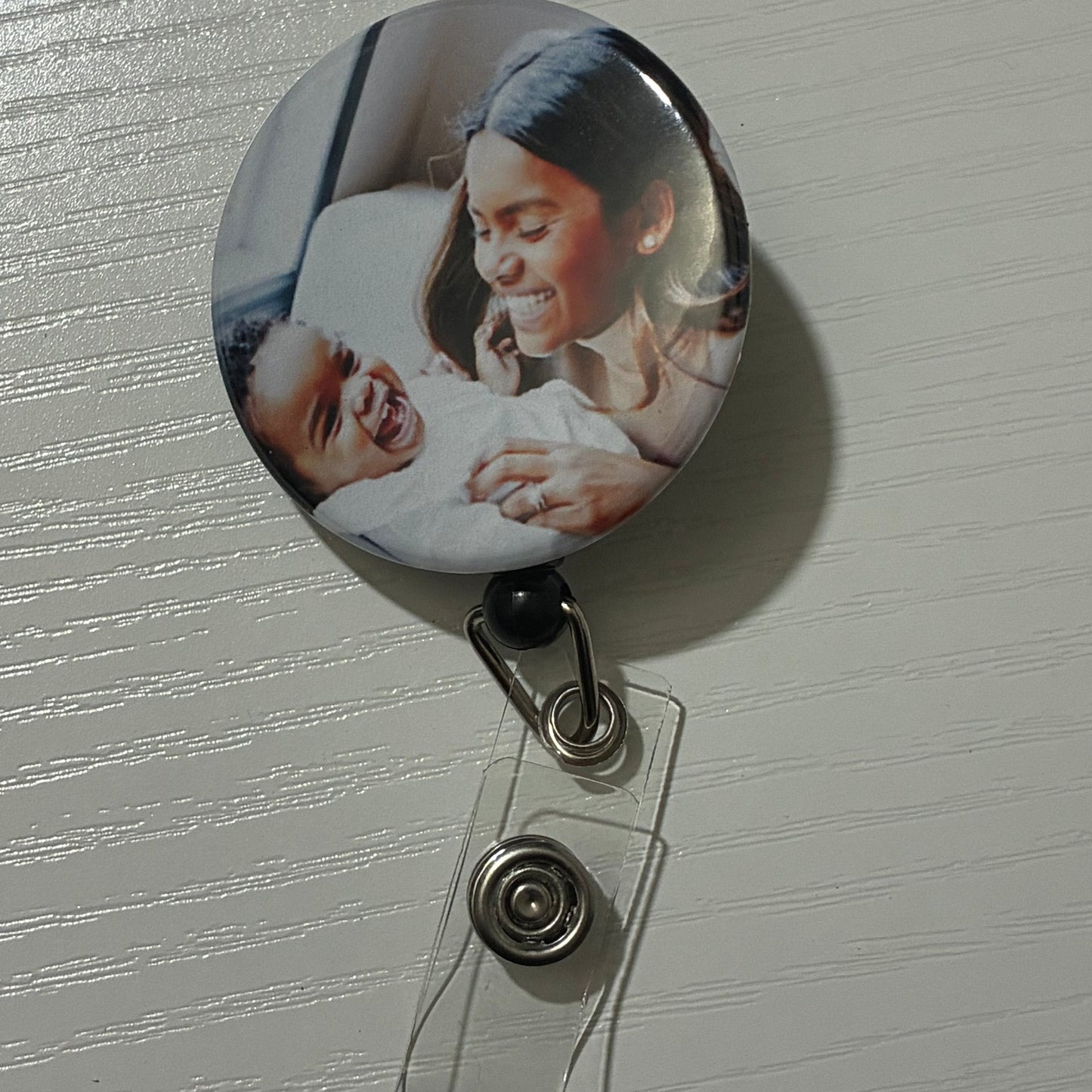Personalized retractable badge reel